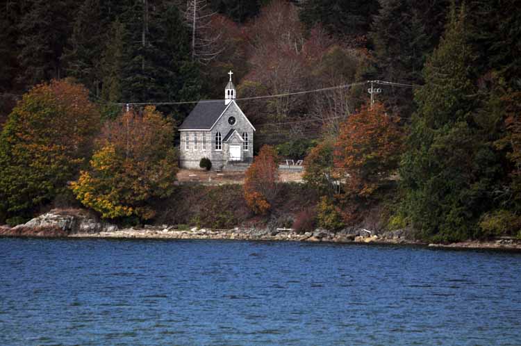 church nestled in trees